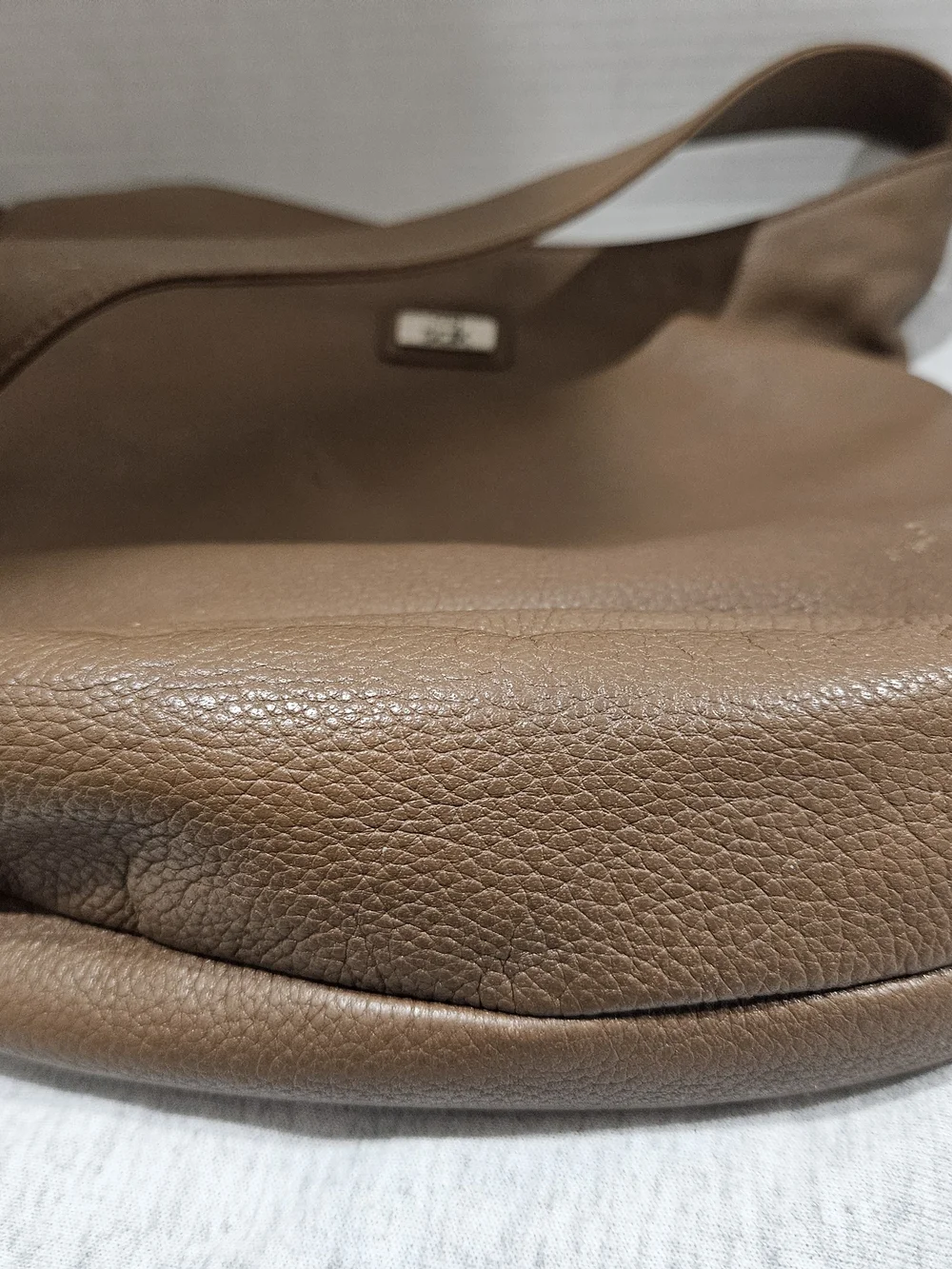 The Sak Brown Pebbled Leather Messenger Bag